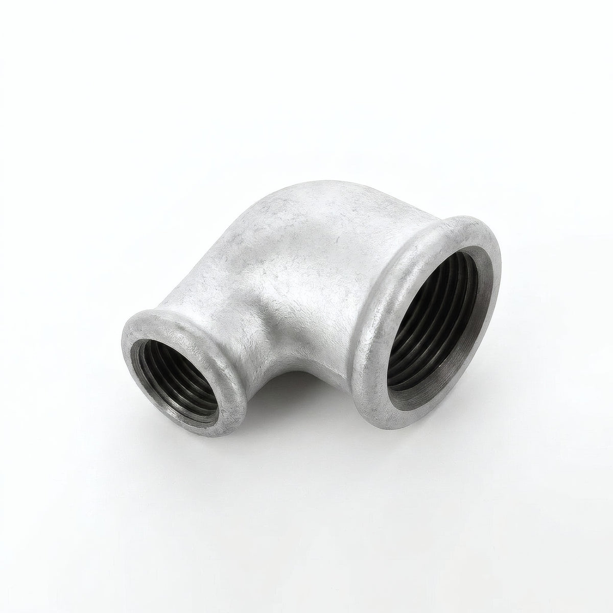 Reducing 90° elbow F/F in galvanised cast iron - product photo on white background 14