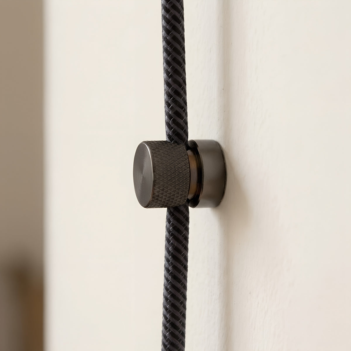 Metal wall-mount cable clip for fabric cable — Black pearl