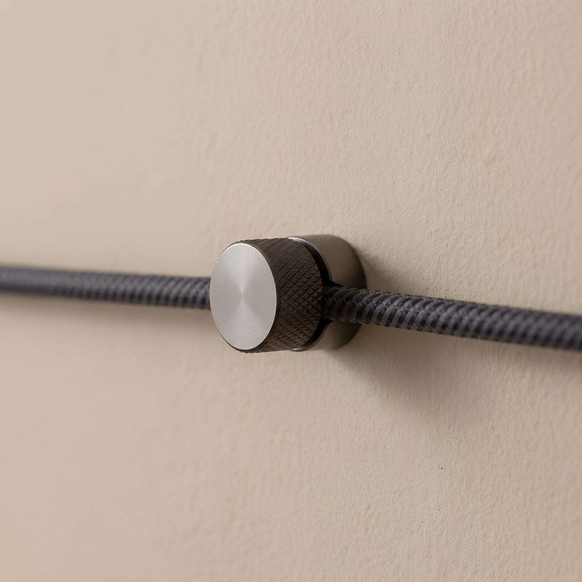 Metal wall-mount cable clip for fabric cable — Black pearl