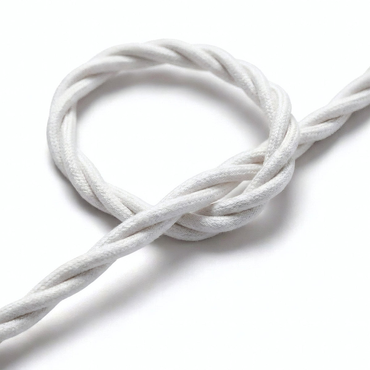 Close-up of the twisted fabric cable, optical white cotton