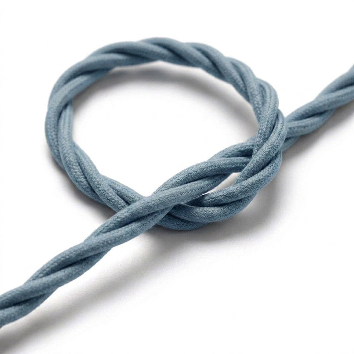 Close-up of the twisted fabric cable, ocean blue cotton