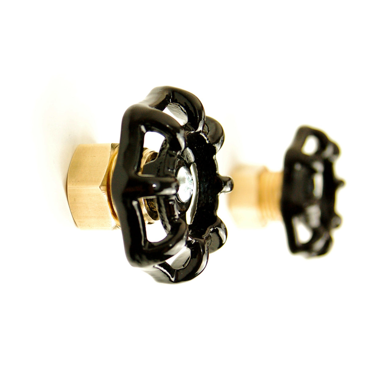 Door handle knob with black valve wheel in industrial style brass