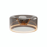 E27 LED donut bulb in smoked glass, Ø 195 mm, switched on, warm light ring, white background