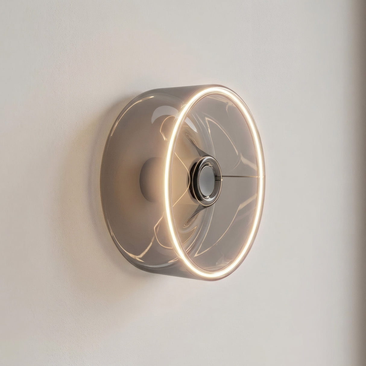 E27 LED donut bulb in smoked glass, Ø 195 mm, lit as a wall light on a plain pale wall