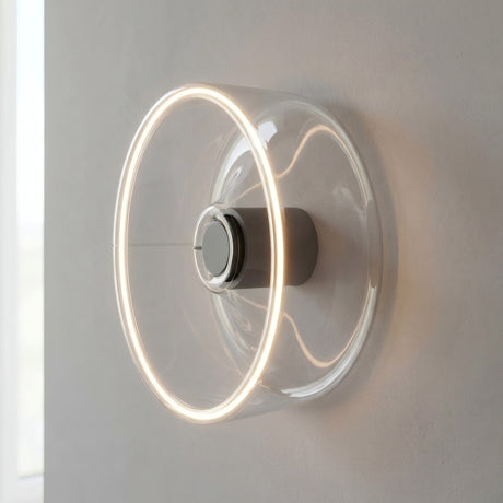 E27 LED donut bulb in clear glass, Ø 195 mm, as a wall light with a warm halo of light