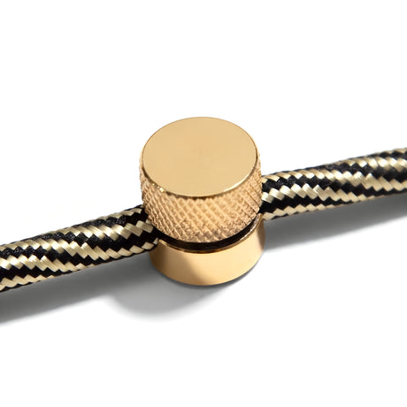 Metal wall-mount cable clip for fabric cable — Brass