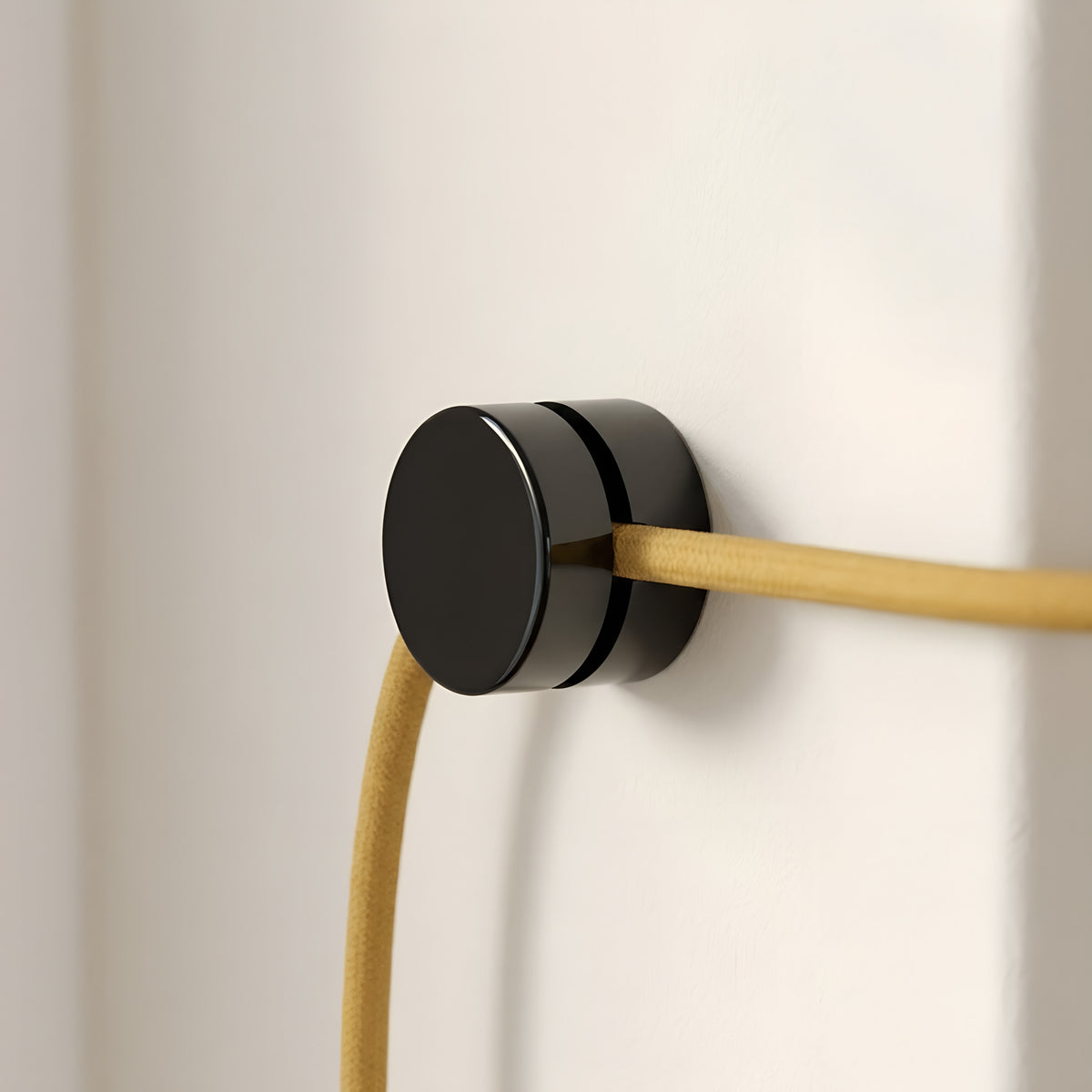 Universal wall cable clip for fabric cable — Black
