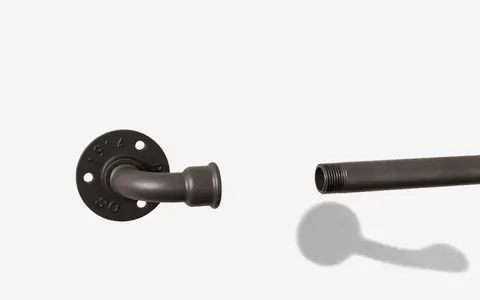 Pipe screwed into the elbow, then the cap