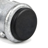 Black plastic insert closing the opening of a galvanized cast iron coupling
