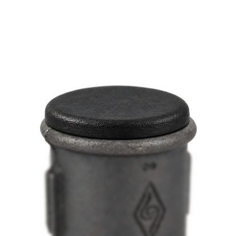 Black plastic insert closing an Eco black malleable iron coupling