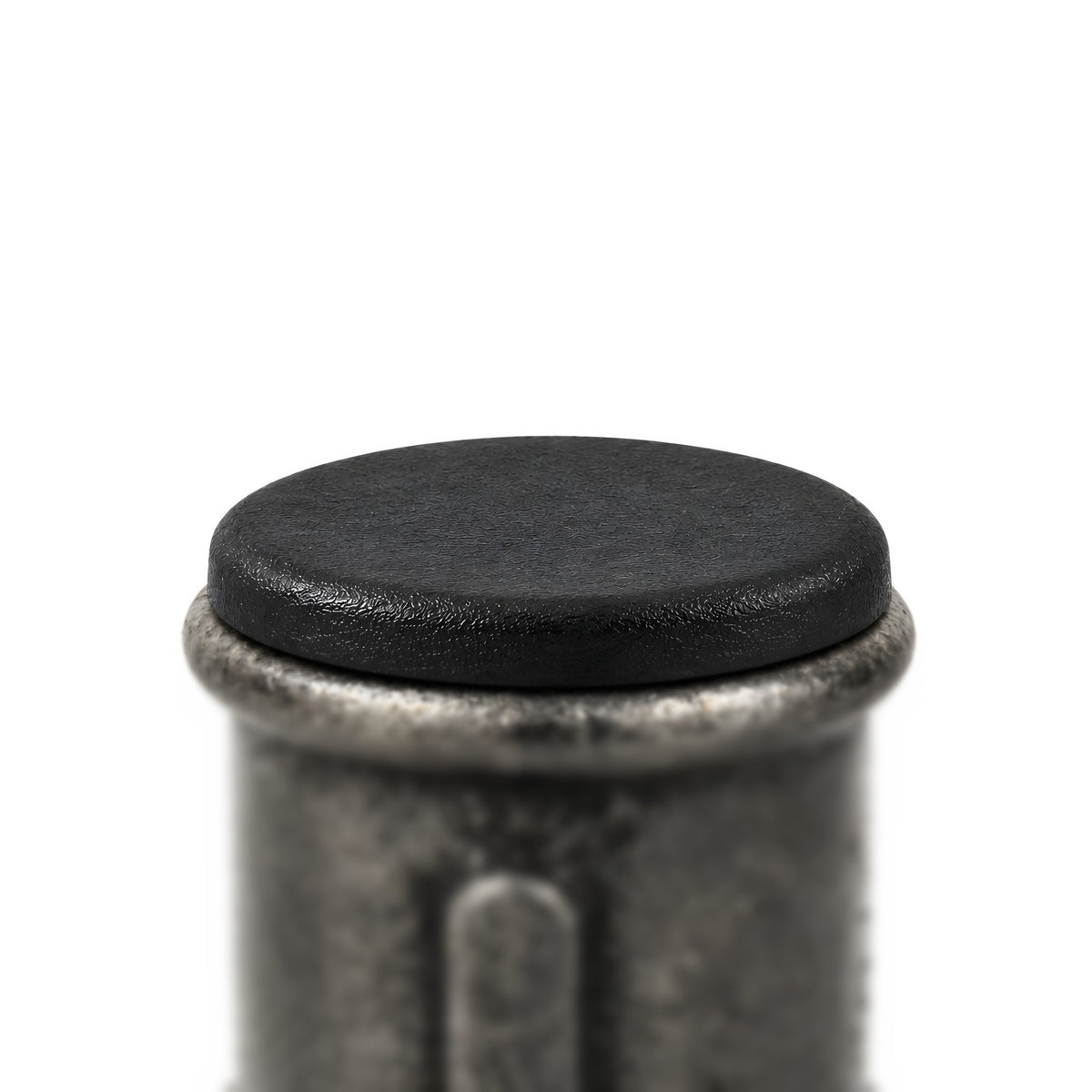 Black plastic insert fitted in a Premium black malleable iron coupling, flat head resting on the edge