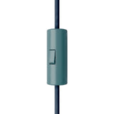 Cylindrical single-pole rocker switch with earth terminal — Petrol blue