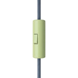 Cylindrical single-pole rocker switch with earth terminal — Meadow green