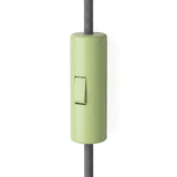 Cylindrical single-pole rocker switch with earth terminal — Meadow green