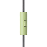 Cylindrical single-pole rocker switch with earth terminal — Meadow green