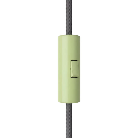 Cylindrical single-pole rocker switch with earth terminal — Meadow green