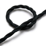 Close-up of the twisted fabric cable, charcoal black cotton