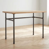 Industrial desk with light oak top on U-frame cast iron and steel base Ø 27 mm, lifestyle scene (top not included)