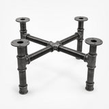 Cross-leg coffee table base, cast iron and varnished steel Ø 42 mm, three-quarter studio view